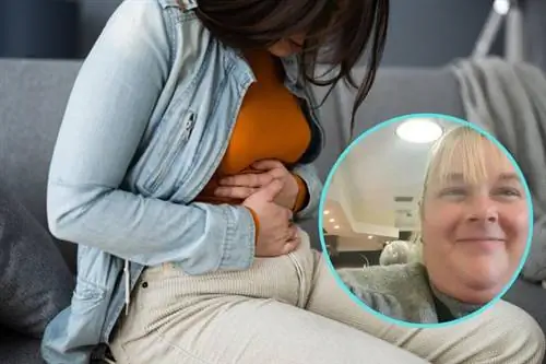 Крупный план женщины с болью в животе