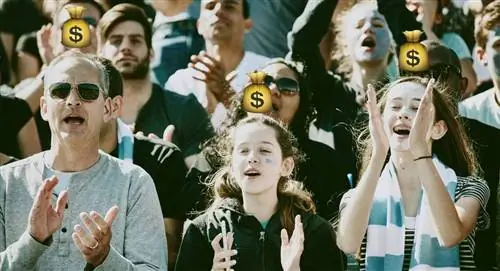 отец и дочери на спортивном матче