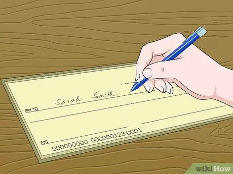 Выпишите чек в банке США канадскому получателю платежа Шаг 1