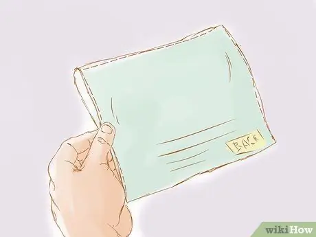 Откройте конверт с тремя перфорированными сторонами Шаг 9