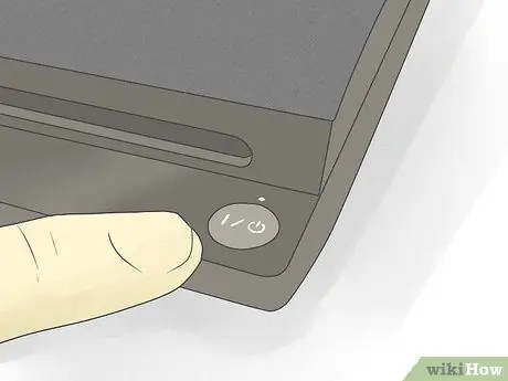 Подключите наушники к PS3 Шаг 8