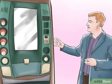 Освободить застрявший предмет из торгового автомата Шаг 2