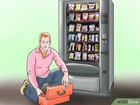 Освободить застрявший предмет из торгового автомата Шаг 3