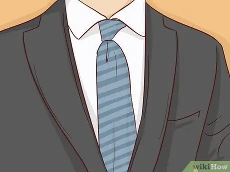 Наденьте двубортный костюм. Шаг 6