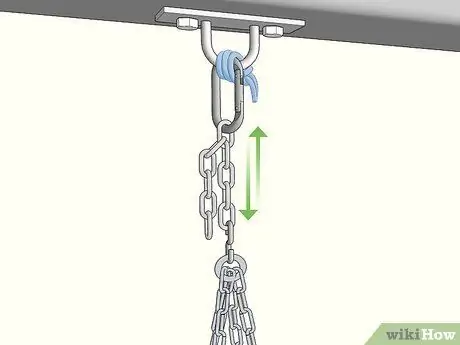 Отрегулируйте высоту боксерского мешка, шаг 9