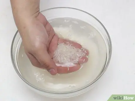 Промыть рис Шаг 3