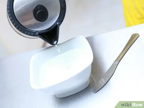 Извлеките чизкейк из сковороды с пружинной формой Шаг 2