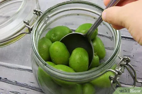 Приготовить маринованные оливки Шаг 3