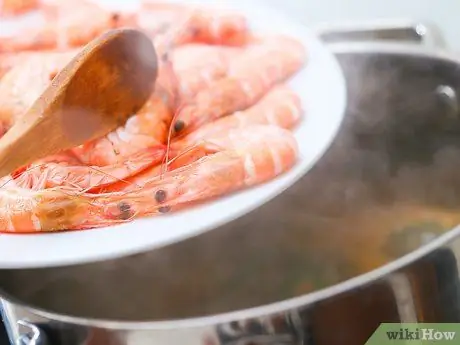 Приготовить синиган на хипон (креветки в кислом супе), шаг 7