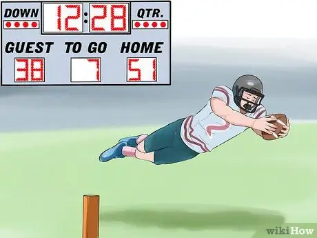 Играть в американский футбол Шаг 5