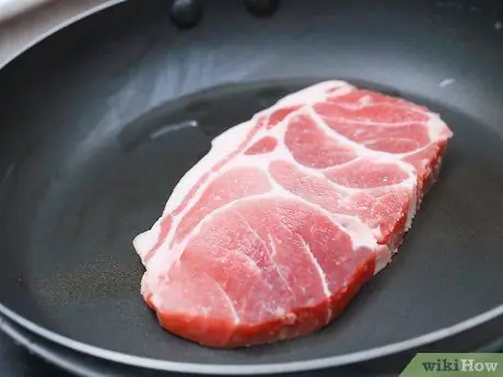 Жарить свиную отбивную Шаг 5