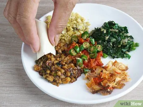 Ешьте эфиопскую кухню Шаг 6