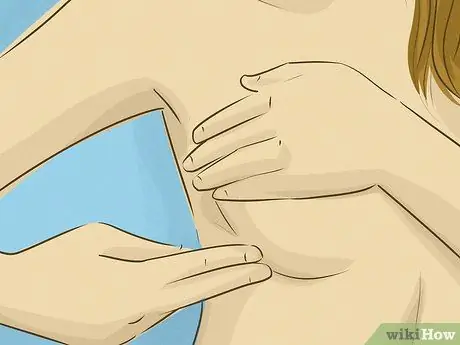 Определить уплотнение в груди Шаг 1