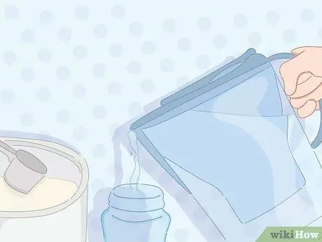 Кормление новорожденного из бутылочки Шаг 4