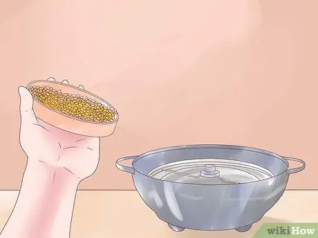 Используйте устройство для приготовления попкорна, шаг 2