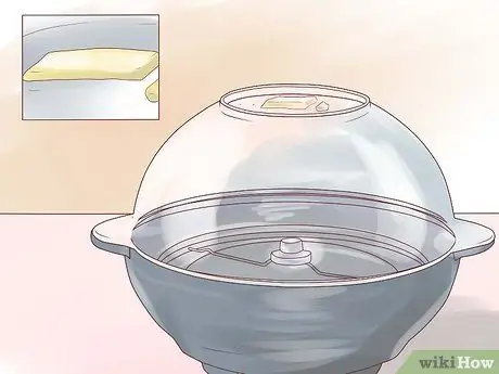 Используйте устройство для приготовления попкорна Шаг 3