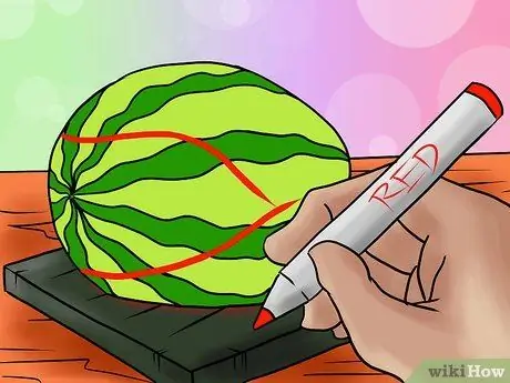 Вырезать динозавра тираннозавра из арбуза Шаг 2