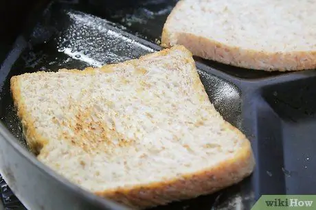 Приготовить тосты с маслом Шаг 7