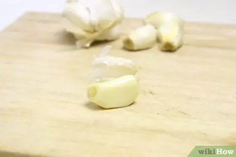 Консервировать свежий чеснок Шаг 4