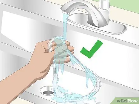 Очистите крышку емкости для быстрого приготовления, шаг 4