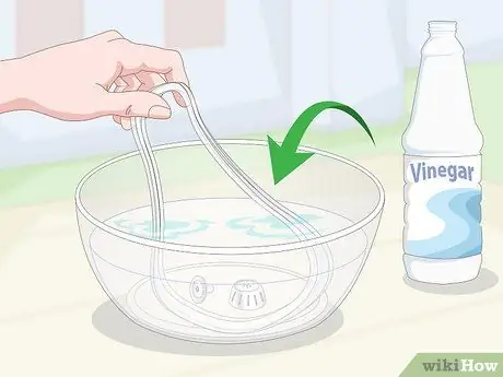 Очистите крышку емкости для быстрого приготовления Шаг 7