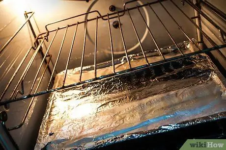 Приготовьте запеченную тилапию с лимонным маслом, шаг 1