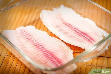 Приготовьте запеченную тилапию с лимонным маслом, шаг 3