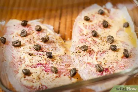 Приготовьте запеченную тилапию с лимонным маслом Шаг 5