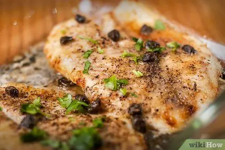 Приготовьте запеченную тилапию с лимонным маслом Шаг 7