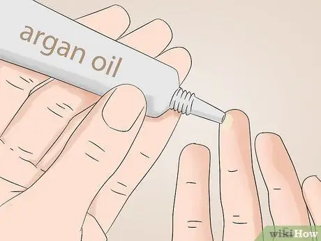 Используйте масло арганы от прыщей Шаг 2