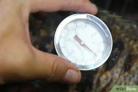 Приготовить или запечь целую рыбу Шаг 14