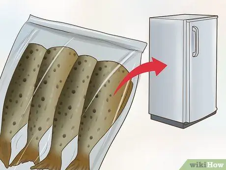 Очистите форель Шаг 7