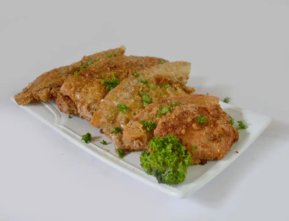 4 способа приготовить свиные отбивные на плите