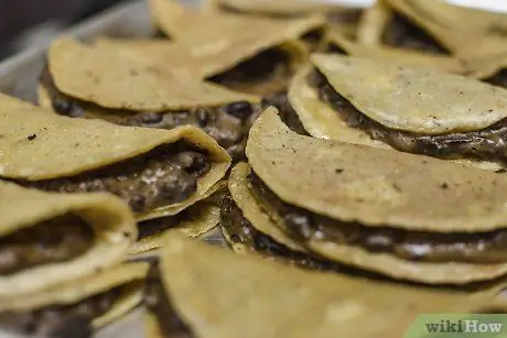 Приготовьте блюда из консервированной фасоли Шаг 3