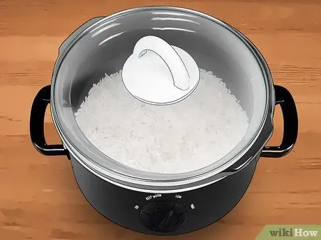 Сохраняйте рис в тепле, шаг 1