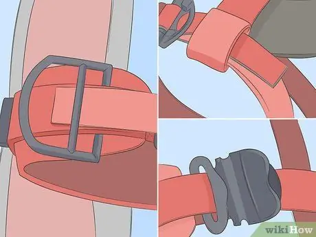 Носите страховочную привязь на все тело Шаг 5