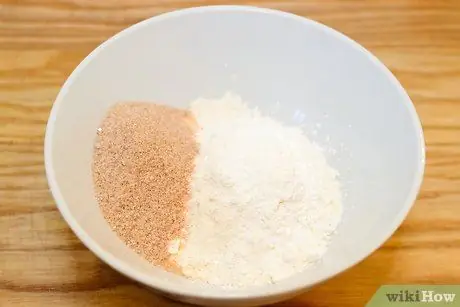 Приготовить запеченные пончики с банановой и шоколадной стружкой Шаг 3