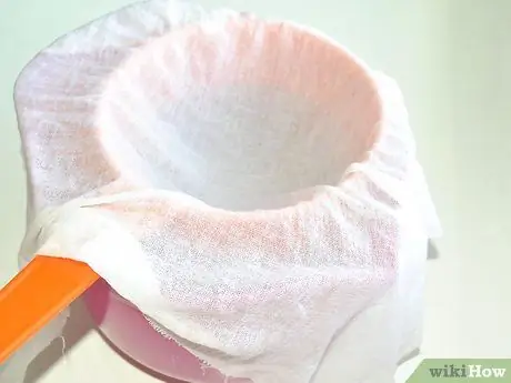 Процедите семена фруктов при приготовлении желе Шаг 3