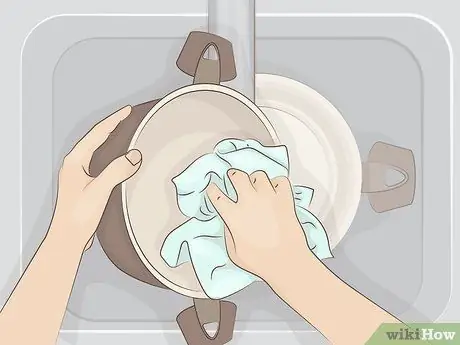 Упакуйте кастрюли и сковороды, шаг 1