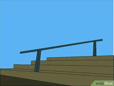 Нанесите воск на бордюр или поручень для шлифовки на скейтборде Шаг 2