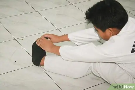 Делайте шпагаты в боевых искусствах Шаг 3