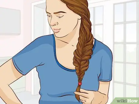 Носите волосы, когда катаетесь на лыжах Шаг 4