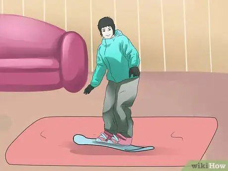 Совершить прыжок на сноуборде Шаг 10