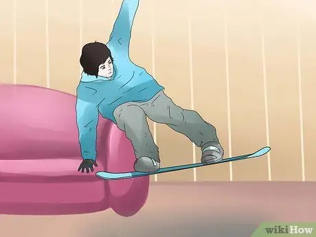 Совершить прыжок на сноуборде Шаг 13