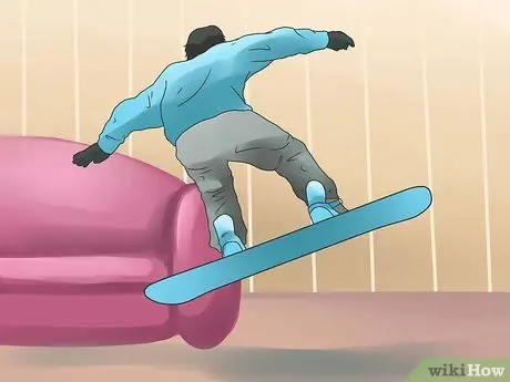 Совершить прыжок на сноуборде Шаг 16