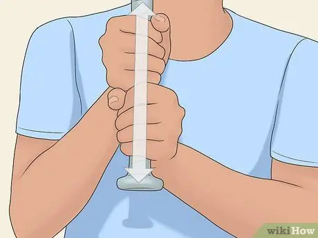 Захватите биту для софтбола Шаг 4