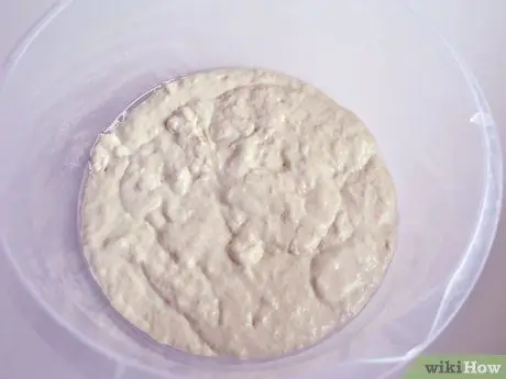 Приготовить растянутый хлеб с чесноком Шаг 4