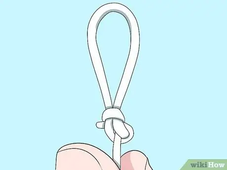 Привяжите леску к лидеру Шаг 1