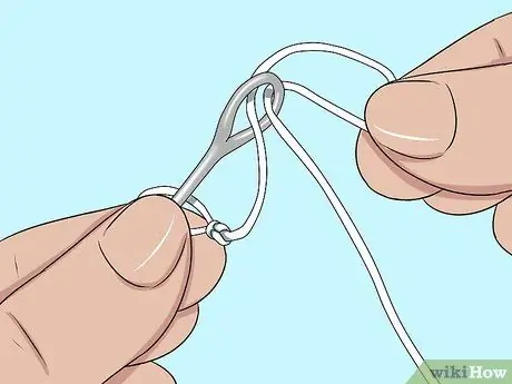 Привяжите трос к поводку Шаг 14