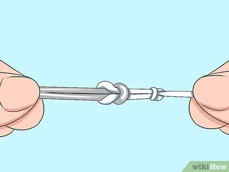 Привяжите трос к поводку Шаг 16